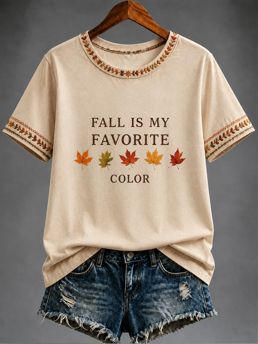 Camiseta feminina de manga curta estampada com a frase “O OUTONO É A MINHA COR PREFERIDA”