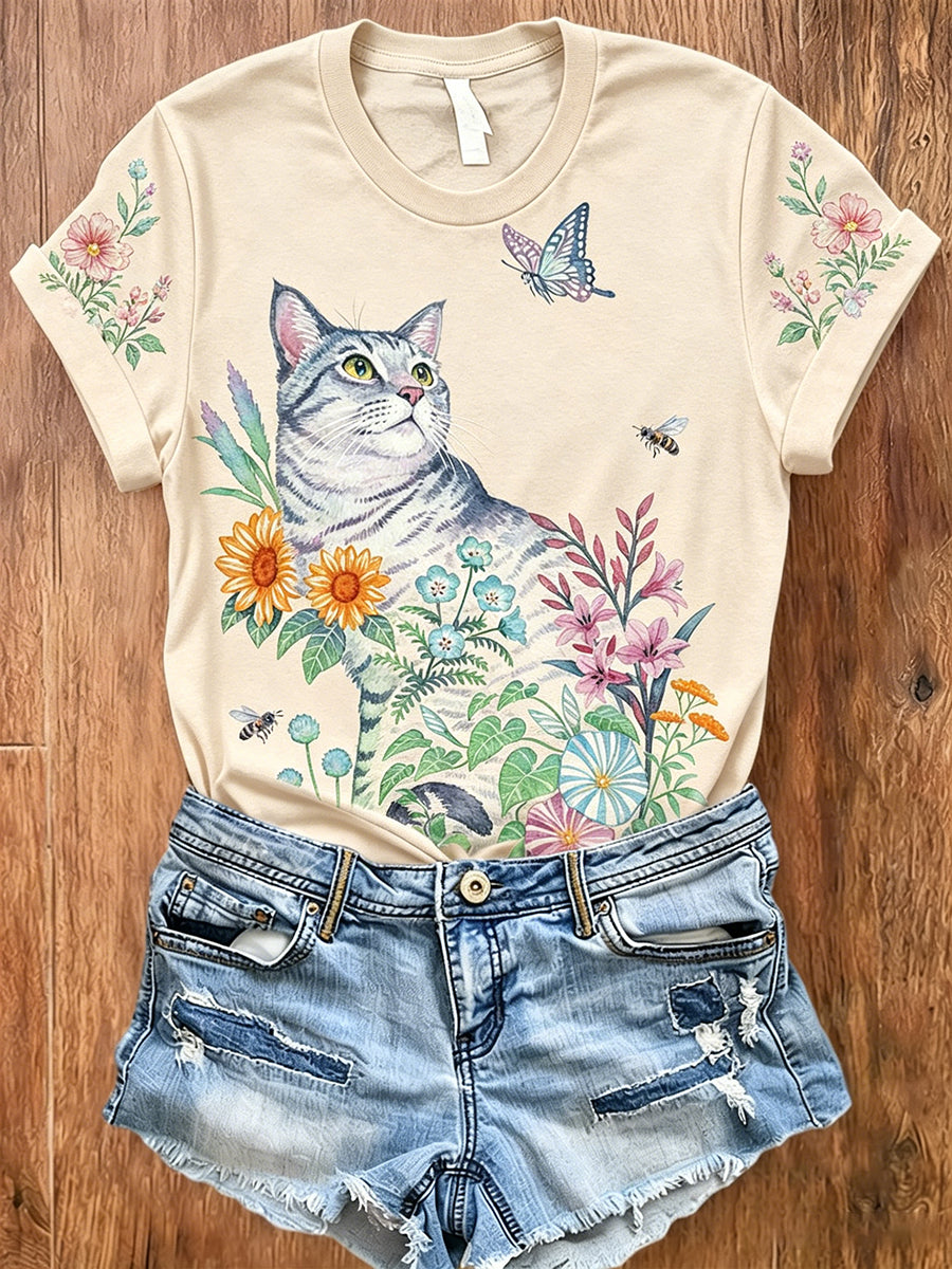 Polo feminino de manga curta com estampa artística de animais e flores