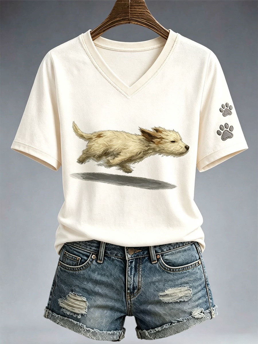 T-shirt bonito do cão correndo das mulheres