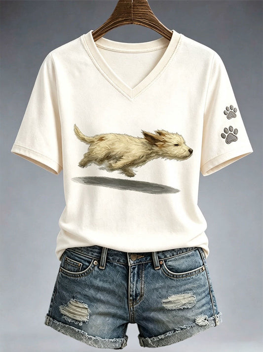 T-shirt bonito do cão correndo das mulheres